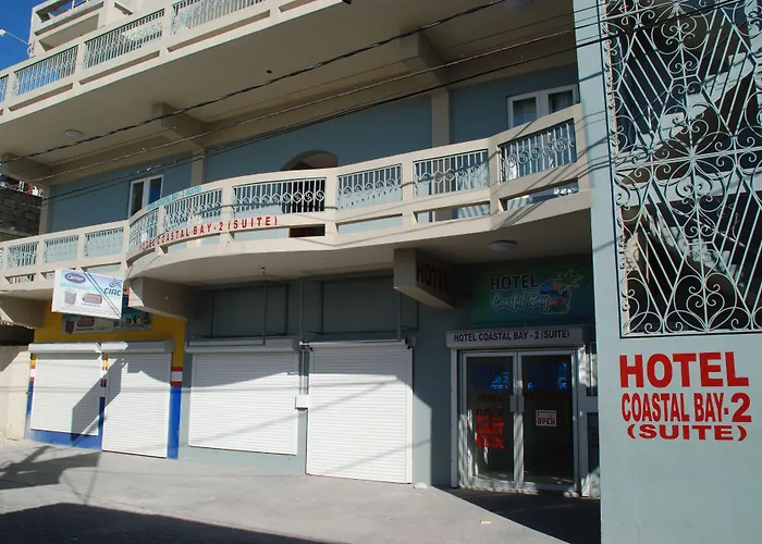 Hotel Coastalbay 2 & Golf Cart Rental